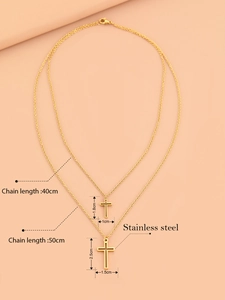 Detail view of double layered gold cross necklaces with size and material specifications