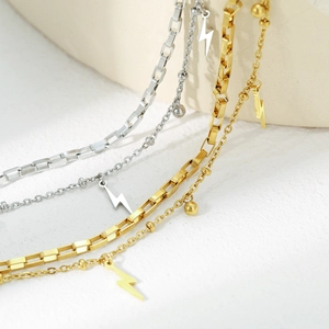 Bohemian stainless steel multi-layer bracelet with lightning bolt charms in gold and silver