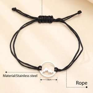 Minimalist stainless steel mountain peak pendant with adjustable black braided rope bracelet