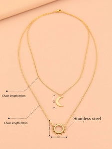 Double-layered gold stainless steel necklace featuring sun and moon pendants with dimensions