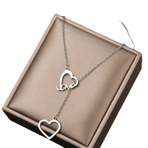 Punk style silver necklace with double heart pendants and Love engraving on gift box