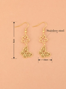 Detail showing 6cm gold hollow butterfly earrings in stainless steel with dimensions
