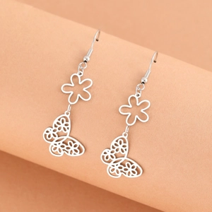 Elegant silver hollow butterfly earrings with floral patterns in minimalist metal design
