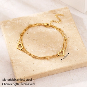 Bracciale doppio strato in acciaio inossidabile dorato con cuori da 1,5cm e piccole sfere