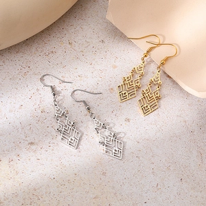 Bohemian geometric leaf earrings in gold and silver finish with hollow metal design