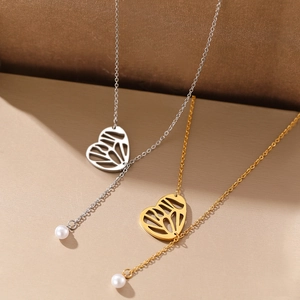 Lariat necklaces with hollow heart pendants and pearl accents in gold and silver colors