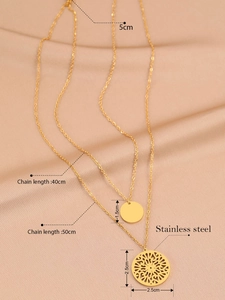 Detail of double-layer stainless steel gold necklace with hollow engraved pendant and sizes