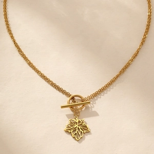 Minimalist gold stainless steel necklace with OT buckle and hollow maple leaf pendant