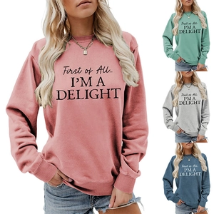 Detail of the high-quality ribbed neckline and graphic print on women sweatshirt