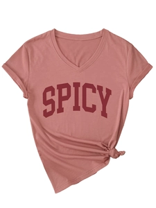 Detail of dusty rose V-neck T-shirt featuring spicy text and front knot design
