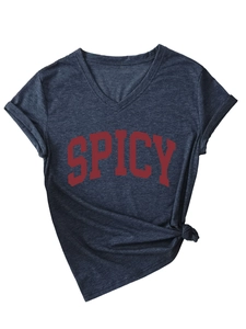 Detail of grey V-neck T-shirt showing SPICY print, rolled sleeves and knotted hem design