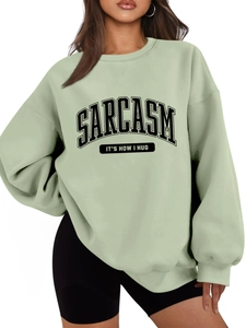 Detail of SARCASM IT'S HOW I HUG text print on light green thick casual sweatshirt