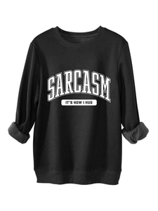 Detail showing the thick fleece lining and printed sarcasm slogan on this black sweatshirt