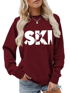 Detail of burgundy SKI crewneck sweatshirt with white graphic and drop shoulder design