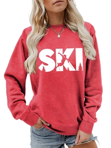 Close-up of red crewneck sweatshirt featuring white SKI lettering and mountain silhouettes