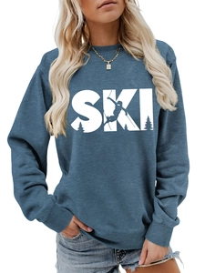 Detail of blue-grey sweatshirt showing the SKI print with skier silhouette and pine trees