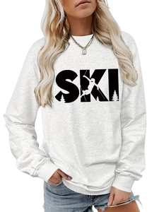 Detail of grey SKI sweatshirt showing ribbed cuffs and printed mountain landscape silhouette