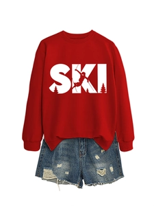 Macro shot of red SKI sweatshirt with white lettering and distressed denim shorts