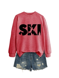 Detailed flat lay of a red long sleeve SKI sweatshirt and distressed denim shorts set