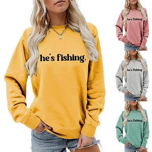 Close-up showing the minimalist slogan print on round neck long sleeve sweatshirts for women