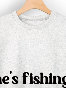 Detail of ribbed crew neck and gray marl fabric with black e's fishing print