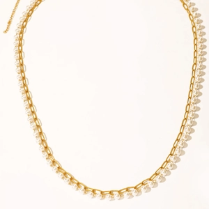 French style double-layer waist chain with gold links and white pearls on white background