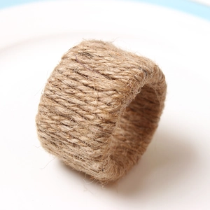 Handcrafted natural jute burlap napkin rings with rustic woven texture for table decor