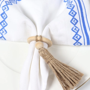 Natural beech wood napkin ring with rustic jute rope tassel and beads for table decor