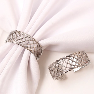 Set of two silver woven mesh napkin rings crafted from durable hollow metal wire