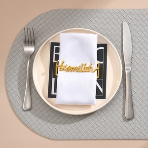 Golden Bismillah metal napkin ring with polished finish for elegant dining table setting