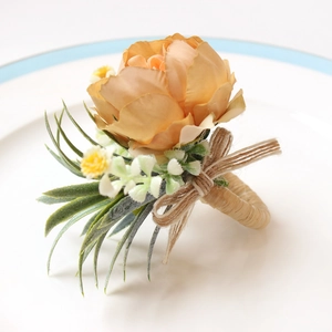 Handmade artificial peach rose napkin ring with jute rope and delicate leaf accents