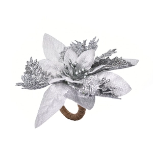 Detailed view of a silver poinsettia napkin ring with glitter petals and jute twine loop