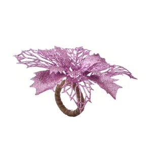 Close-up of a festive purple glitter flower napkin ring with a natural woven band