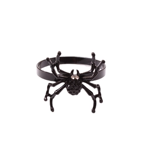 Black spider napkin ring for Halloween table decoration with realistic textured body