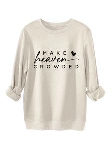 Detailed close-up of the ribbed crewneck and soft fleece fabric with letter print