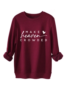 Detail of burgundy fleece sweatshirt with white MAKE heaven CROWDED text print