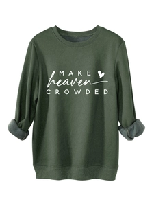 Close-up of dark green sweatshirt featuring warm gray fleece lining and ribbed cuffs