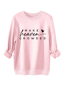 Detailed view of soft pink fleece sweatshirt with black Make Heaven Crowded heart print