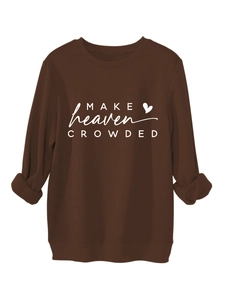 Detail view of the ribbed cuffs and white 'MAKE heaven CROWDED' print on brown sweatshirt