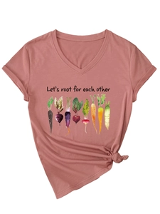 Detail of V-neck pink cotton T-shirt featuring root vegetable graphics and slogan
