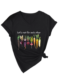 Detail of V-neck T-shirt showing watercolor vegetable print and stylish side knot
