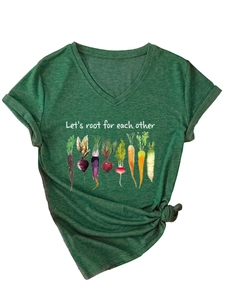 Detail of V-neck dark green t-shirt with Let's root for each other vegetable graphic