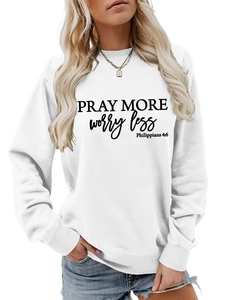 Detail of Pray More Worry Less print on white crewneck sweatshirt with ribbed cuffs