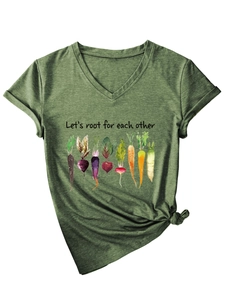 Detail of V-neck green T-shirt featuring vegetable graphics and knotted hem design