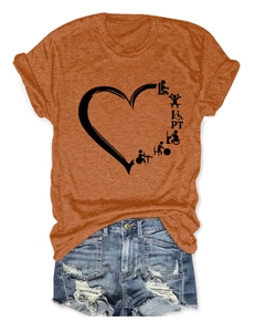 Flat lay of brown cotton T-shirt with heart PT print and ripped denim shorts