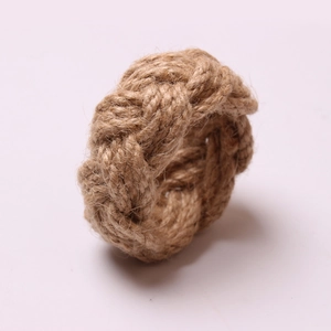 Handcrafted natural jute braided napkin ring with a rustic rope twist texture