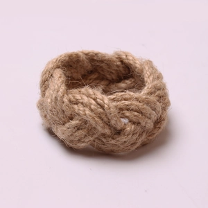 Handcrafted natural jute rope napkin ring with rustic braided texture for table decor