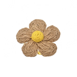 Handmade woven flower napkin ring with brown petals and golden metal buckle