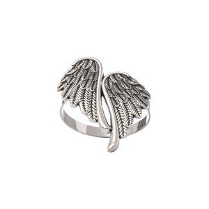 Vintage silver angel wing napkin ring with intricate feather texture for Christmas decor