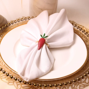 Carrot napkin ring with red enamel and gold loop for Thanksgiving table setting